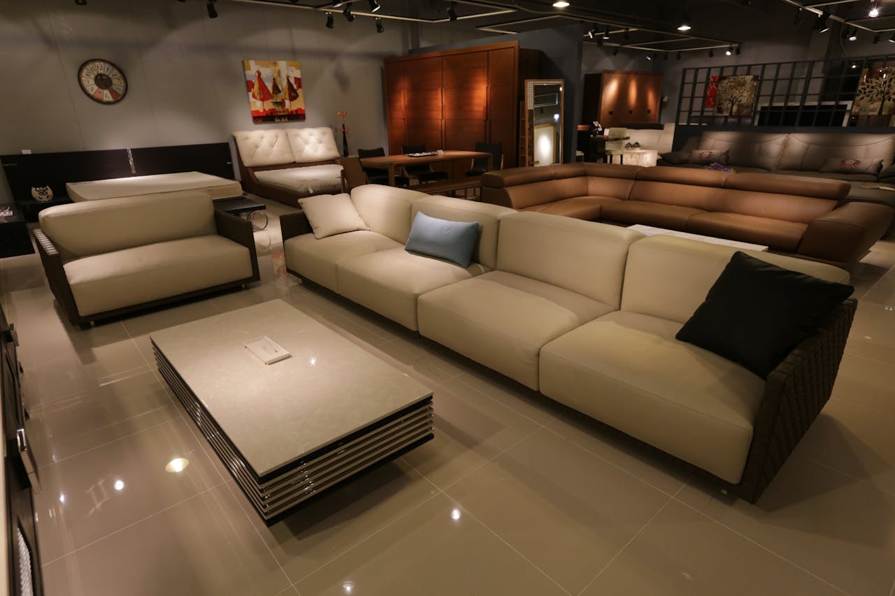 services-06 Elegant living room showcasing modern furniture with plush sofas and ambient lighting.