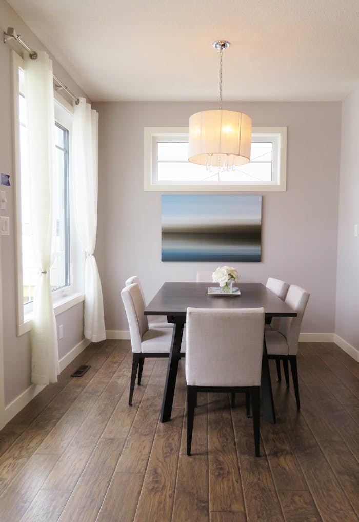 services-02 A bright, contemporary dining room with minimalist decor and modern furnishings.